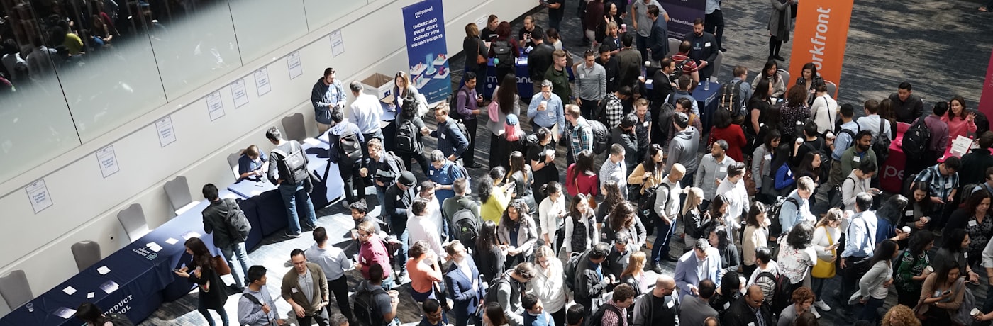 Members networking at an international business conference